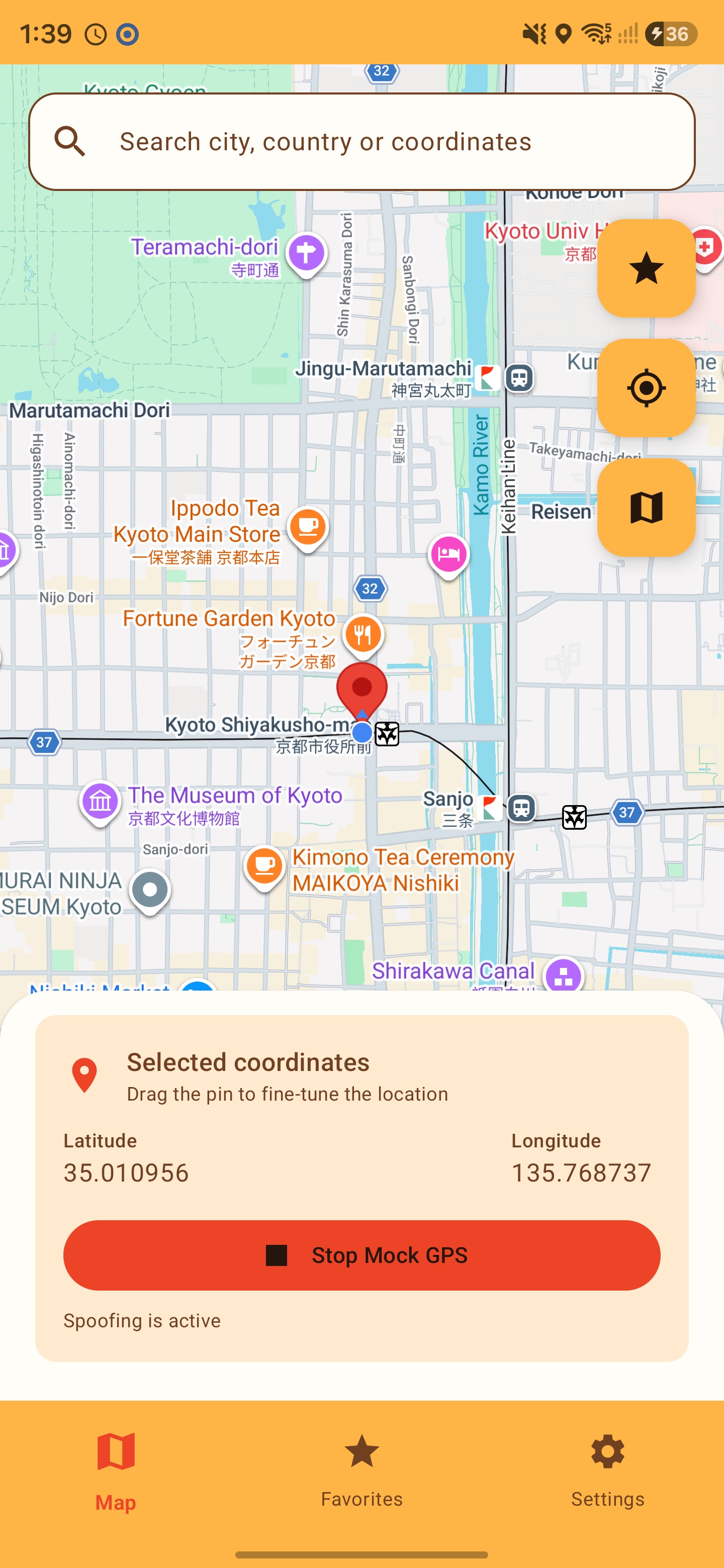 MockGPS map with a pin in Kyoto, selected coordinates, and a Stop MockGPS button
